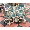 Image 1 : SOLID TABLE, 4 CHAIRS/CUSHIONS (SWIVEL WHEELS)