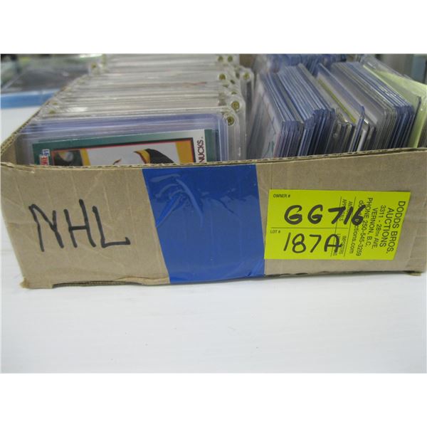 BOX OF NHL CARDS IN PROTECTIVE CASES