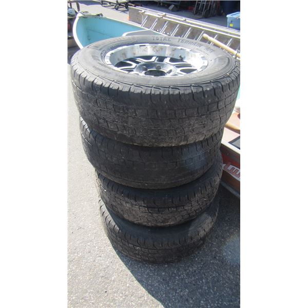 SET OF 26570R17 TIRES ON CHEV RIMS