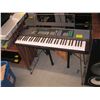 Image 1 : ELECTRIC YAMAHA ORGAN WITH LARGE SELECTION OF MUSIC AND ASSORTED BIN OF CORDS ETC