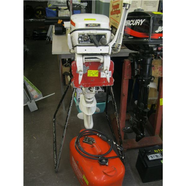 9.9 JOHNSON OUTBOARD MOTOR WITH GAS CAN. NOT STAND