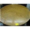 Image 2 : ROUND OAK TABLE WITH 4 BLACK CHAIRS