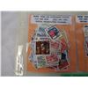 Image 2 : Plastic sleeve containing over 400 stamps