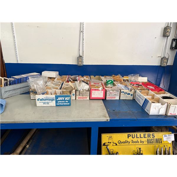 GROUP OF DEALER BLUE BOOKS FOR MOTORCYCLES, SNOWMOBILES 1990'S, TABLE TOP OF ASST CLIPS, AUTO