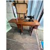 Image 1 : Singer Treadle sewing machine with electric light (water damaged to bottom of table) on casters