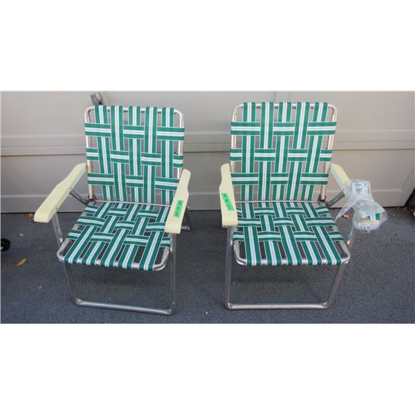 (2) Folding lawn chairs - plastic arms decent shape, webbing good, extra package of webbing - folds/