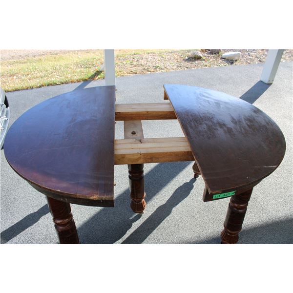 Dining table with leaves, 5 legs with casters, needs some repair to 1 leg - 45  diameter 10.5  wide 