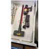Image 1 : DYSON V10 MOTORHEAD CORDLESS VACUUM WITH ACCESSORIES - TESTED WORKING, RETAIL $599