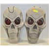 PAIR OF OPERATED SKULL DECOR