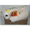 Image 1 : WICKER BASKET W/ WHITE FAUX FUR RUG