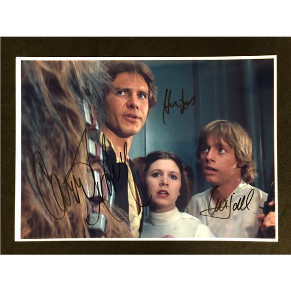 STAR WARS CAST (FISHER, HAMILL, FORD) SIGNED 8 X 10 (RA COA)