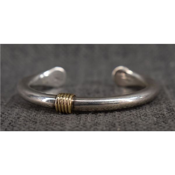 NAVAJO INDAIN SILVER AND GOLD BRACELET BY ARTIE YELLOWHORSE