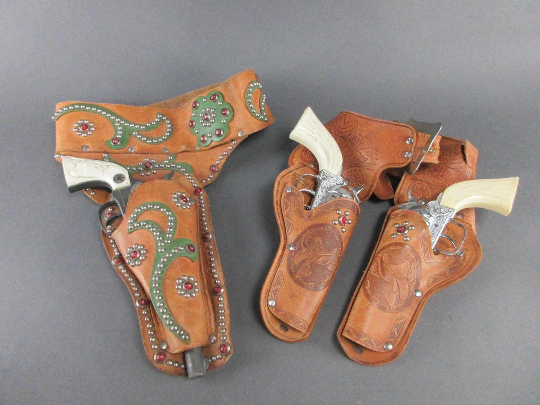 2 Studded Kids Holsters With Cap Guns