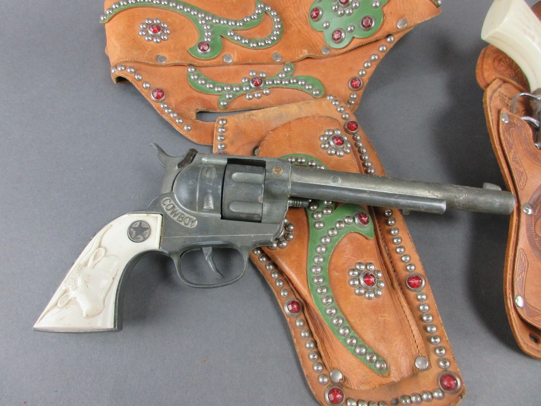 2 Studded Kids Holsters With Cap Guns