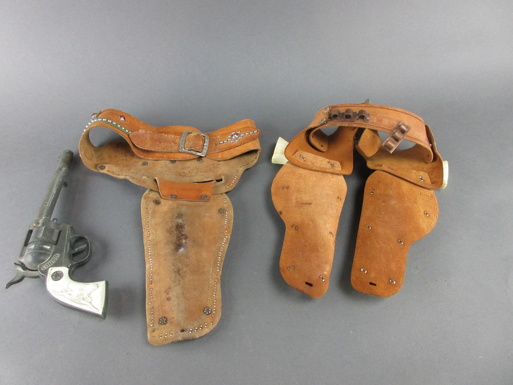 2 Studded Kids Holsters With Cap Guns