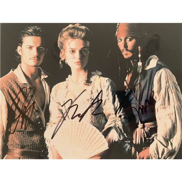 Pirates of the Caribbean cast Orlando Bloom, Johnny Depp, and Keira Knightley signed photo