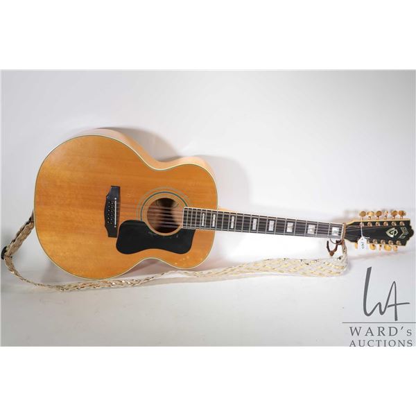 Guild F412-BLD jumbo 12 string acoustic guitar circa 1975, serial number 122823, with inlaid head an