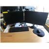 Image 2 : Complete workstation with two monitors DELL and ViewSonic, a keyboard, a mouse, a contemporary work 