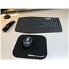 Image 3 : LG 49 inches Smart TV model 49UN73OOAUD, a Logitech mouse and keyboard, and a Logitech webcam
