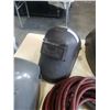 Image 4 : 3 WELDING HELMETS AND TORCH HOSE LINE