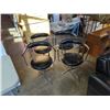 Image 1 : 4 BLACK LEATHER LOOK SWIVEL CHAIRS