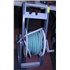 Image 1 : HOSE AND STAND 100' LONG