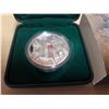Image 2 : 2002 Queen’s Golden Jubilee Silver Dollar. Proof. Bright White. Housed in its original green case.