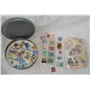 Image 1 : Loose stamps in old film cannister and baggie of stamps on paper