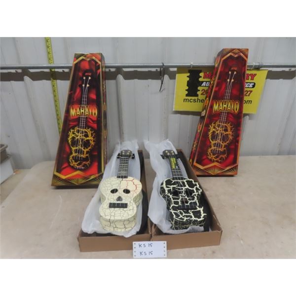 2 Mahalo Skull Face Ukuleles - New in Box ; 1 Black, 1 White
