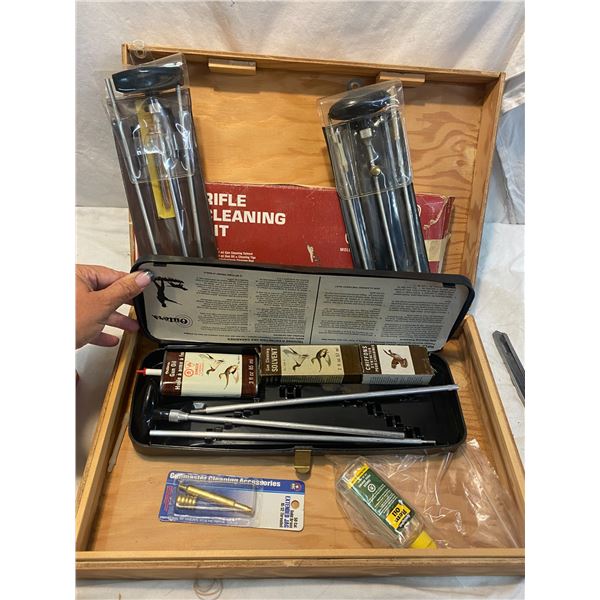 Gun cleaning kits in wood box