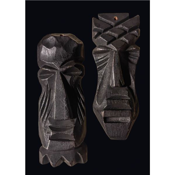 EARLY SCHMALTZ & VAN OOSTING PAIR TIKI PENDANT CHARMS.