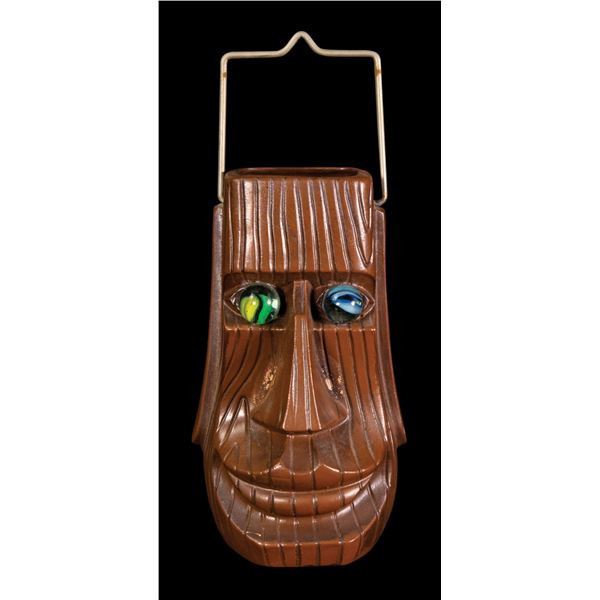 MOAI TIKI HEAD LANTERN WITH MARBLE EYES.