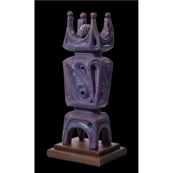 LEROY SCHMALTZ - "THE DARK APPLE" WOOD SCULPTURE ON BASE.