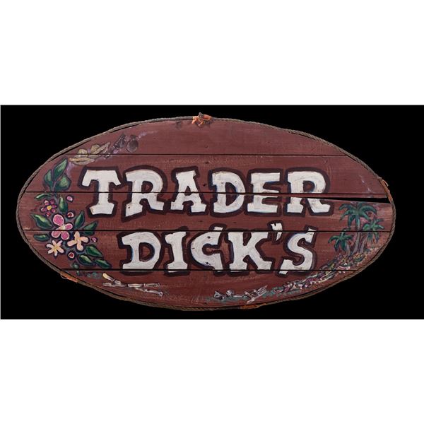 TRADER DICK'S CARVED OVAL OA HUT SIGN.