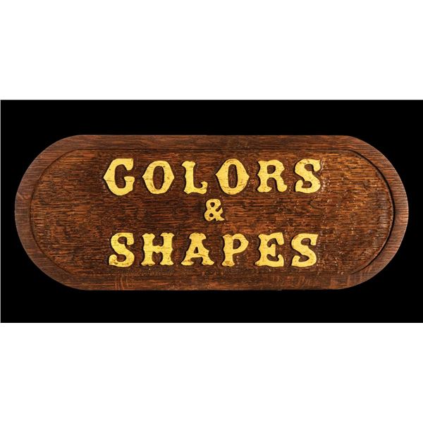 PAIR OF OA CARVED "RARE & UNUSUAL" and "COLORS & SHAPES" SIGNS.