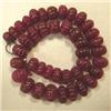 Image 1 : 472 CTS CARVED GLASS FILLED COLOR ENHANCED RUBY STRAND 17-10 MM - 16 INCHES - TEMPORARY METAL CLASP