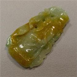 85 CTS CARVED JADE 53x29 MM