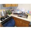 Image 2 : RIGHT-SIDE COUNTERTOP: CONTAINERS, COOKIE JAR, PUTTY STKS, KNIFE, PANS (NOT SURE OF USE); GRAVY BOAT