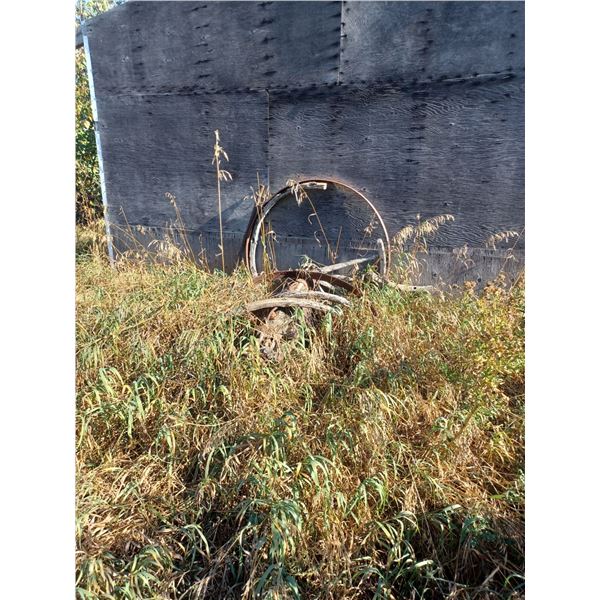 TWO OLD WAGON WHEELS, REBAR CHUNK