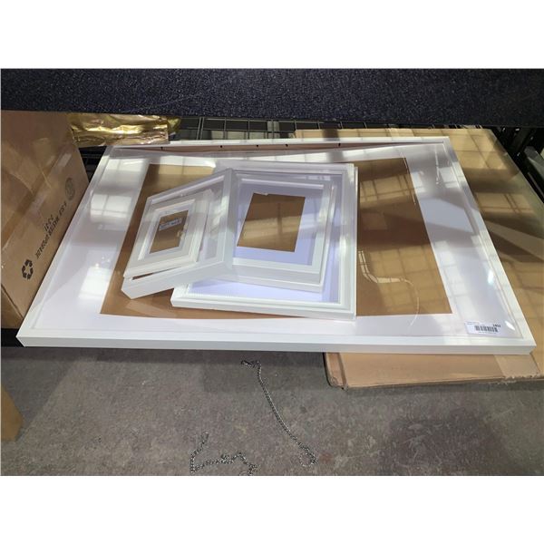 Lot of assorted white picture frames