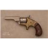 Image 2 : Colt model 1872 open-top 22 cal.  S.A. revolver,  nickle-plated serial #27315.  The Colt shows an  o