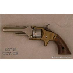 Manhattan Firearms Co. .22 cal. seven shot  revolver engraved, nickel plated, brass frame,  wood gri