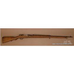 Arisaka bolt action military rifle, 6.5 mm cal.,  31-1/2” barrel, blue finish, wood stock, #1128206.