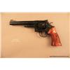 Image 2 : Smith & Wesson Model 25-2 DA revolver, .45 cal.  (Model 1950), 6-1/2” barrel, blue finish,  checkere