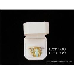 Superb vintage 18 karat yellow gold ladies ring  set with a fine opal center weighing approx. 4.00  