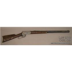 Winchester Model 1894 lever action rifle, .30 WCF  cal., 26” round barrel, blue finish, custom  engr