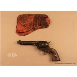 Colt SAA revolver, .45 cal., 5-1/2” barrel, dark  patina finish, hand-made non-factory wood grips,  