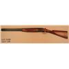 Image 1 : BROWNING Citori O/U Super-Posed shotgun with  English style straight stock, choked ** and **  with 2