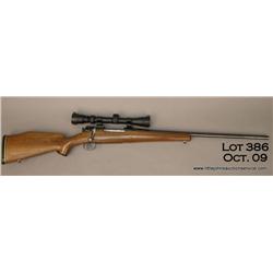 Sporterized Springfield Model ’03 bolt-action  rifle, appears to still be .30 cal as the muzzle  of 