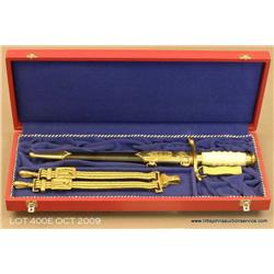 Cased East German Army officer's dagger and  hanger.  Est. $250 - $500